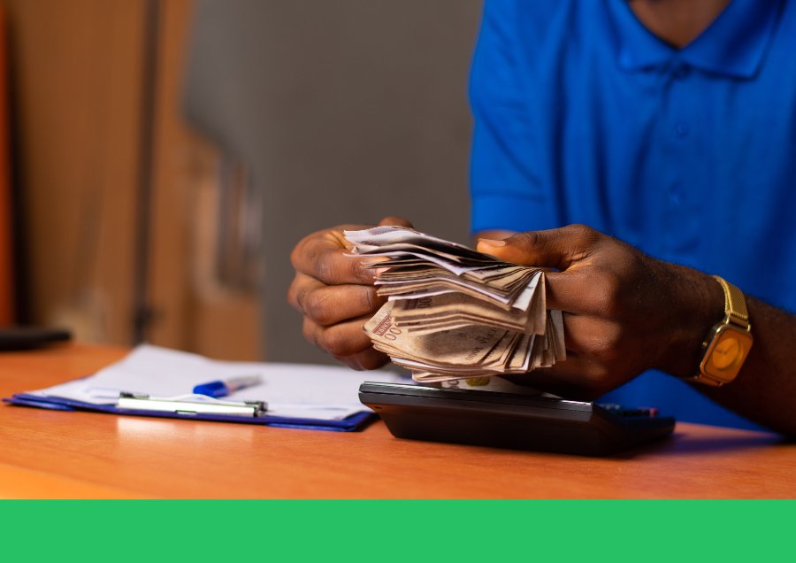 Man counting money from his savings